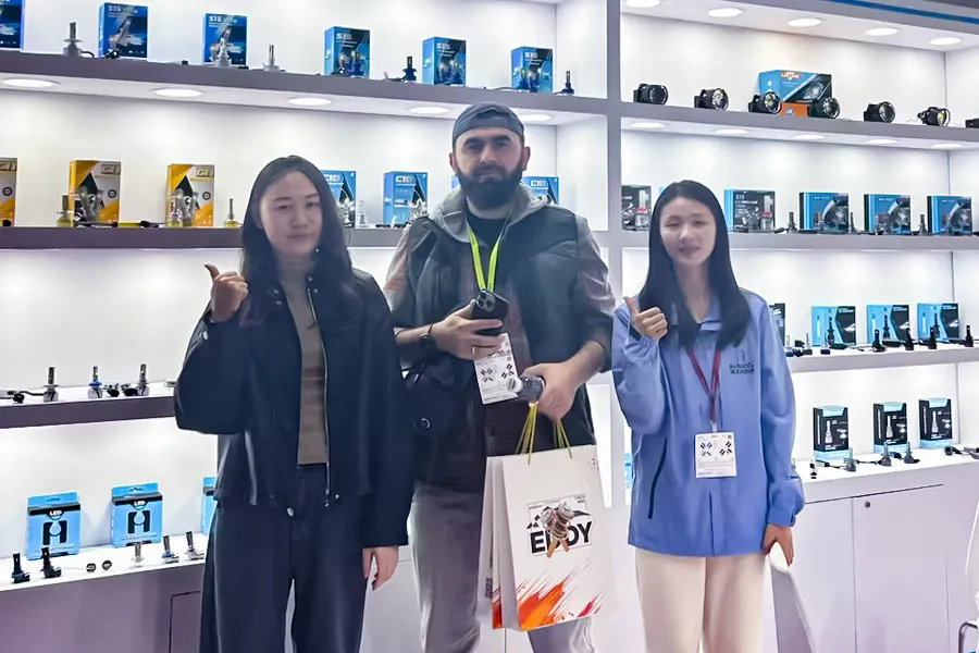HAIZG branded display wall and product shelves inside an automotive aftermarket expo hall